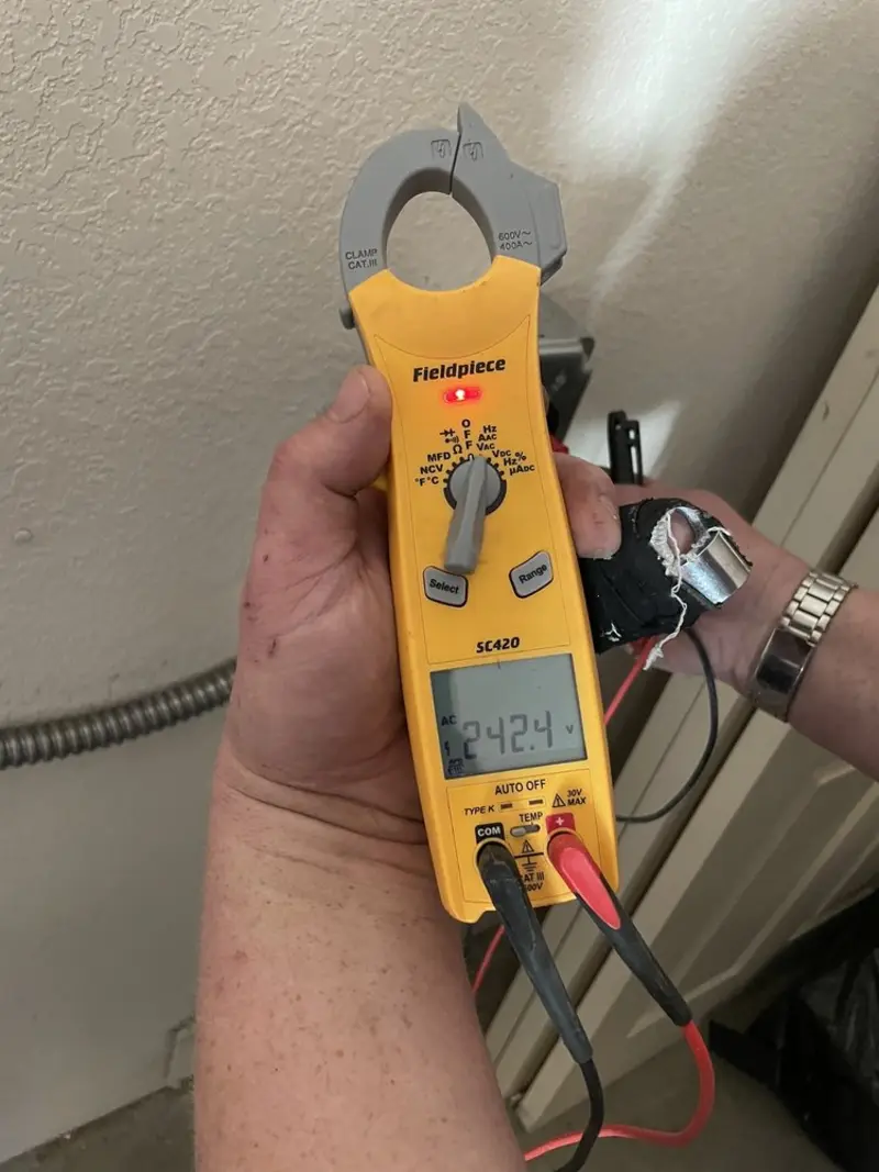 Voltage testing with clamp meter during Hot Tub / Pool Electrical Wiring in Rockland